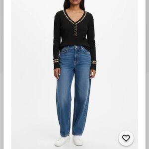 Free People Rainbow Thermal Henley embroidered Raw edge black Sz. M
Runs bigger